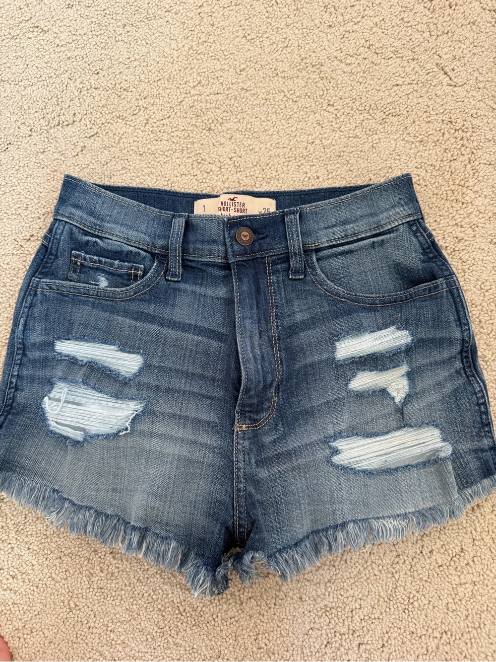 Hollister Frayed High-Rise Distressed Denim Shorts in Blue